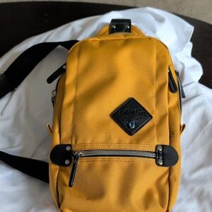 Yellow Crossbody Sling Backpack with Black Trim